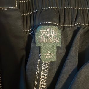 White stitched pants